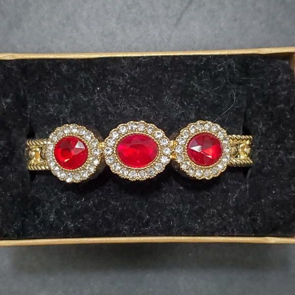 Monet gold tone red rhinestone bracelet